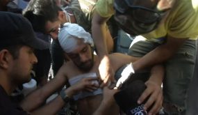 5204EV-IRAQ-PROTESTS_INJURED