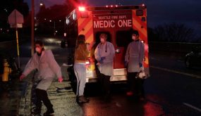 Medics respond to an overdose call at a homeless encampment, during the coronavirus disease (COVID-19) outbreak, in Seattle, Washington, U.S. March 30, 2020. REUTERS/David Ryder